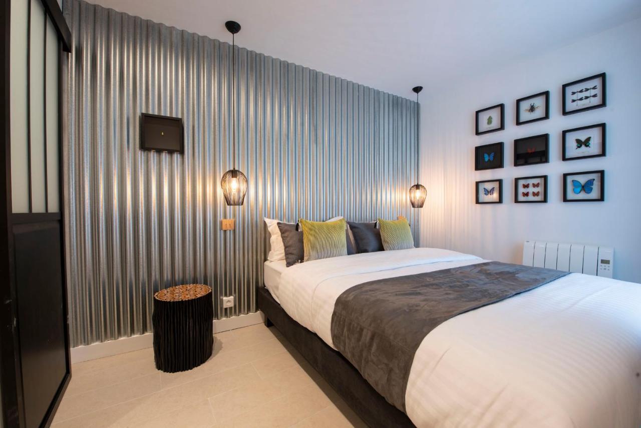 Out Of Africa Apartment Paris Bagian luar foto