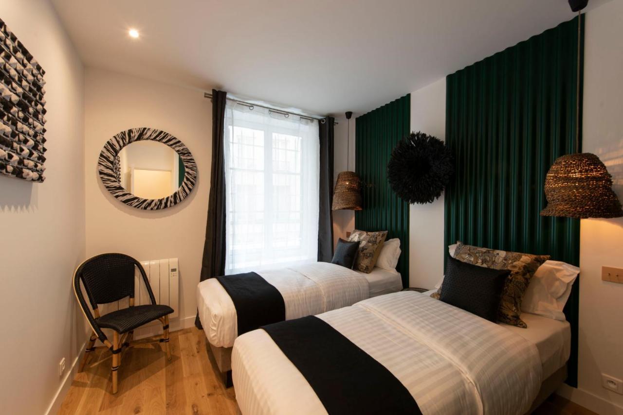Out Of Africa Apartment Paris Bagian luar foto